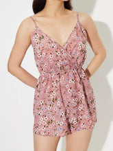 Rosa Jumpsuit mit Blumenmuster, Spaghettiträgern und V-Ausschnitt