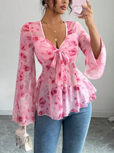 Pink floral print chiffon blouse with bell sleeves and front tie detail for stylish casual wear
