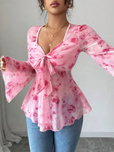 Pink floral print chiffon blouse with bell sleeves and front knot detail for elegant casual wear