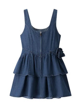 Denim sleeveless floral ruffle layered dress with peplum skirt and fabric flower accent on the side