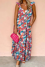 Floral ruffled strap V neck maxi dress with pockets on white background