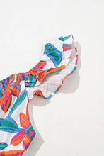 Vibrant tropical leaf scrunchie on floral ruffled strap V neck maxi dress