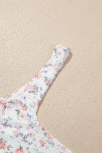 White floral textured square neck sleeveless bodysuit with delicate pink and purple blossoms print