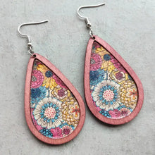 Pair of floral wood teardrop earrings with colorful pattern