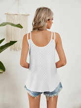 White florira cutout eyelet tank with perforated fabric and spaghetti straps for a stylish summer look