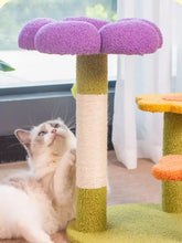 Purple flower cat tree with scratching post, green base and beige sisal