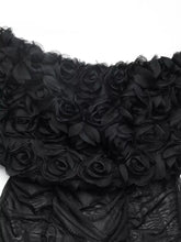 Black flower off-shoulder mesh bodysuit features sheer mesh bodice and layered 3d fabric roses design