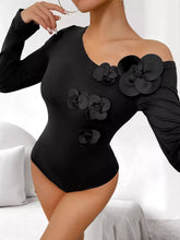 Black off-the-shoulder long sleeve bodysuit with large floral appliqués flower one shoulder long sleeve design