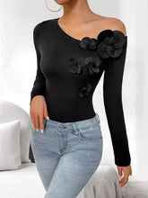 Black flower one shoulder long sleeve bodysuit with three-dimensional floral appliqués and shoulder long sleeve design