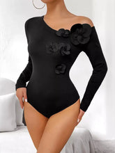 Black off-the-shoulder long sleeve bodysuit with three-dimensional floral appliqués and shoulder long design