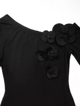 Black flower one shoulder long sleeve bodysuit with three-dimensional floral appliqués on shoulder and chest