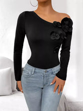 Black flower one shoulder long sleeve bodysuit with three-dimensional floral appliqués on the sleeve