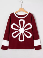 Maroon flower patched round neck long sleeve top with white outlined flower and contrasting cuffs machine wash cold