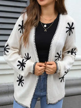 Flower pattern open front knit cardigan with black starburst embroidery