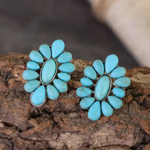 Pair of flower shape artificial turquoise cluster earrings with silver settings