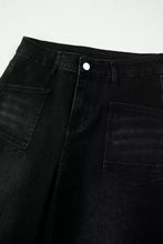Black denim frayed cropped straight jeans with straight-leg cut and white button closure for casual wear