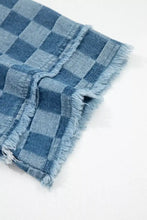 Blue and light blue checkered denim mini dress featuring a frayed hem detail and textured fabric design