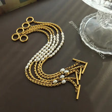 Bracciale in Acciaio Titanio con Perla d'Acqua Dolce Oro Taglia Unica Bracciali