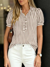 Frill striped puff sleeve blouse in brown and white vertical stripes with button-down front and puffed short sleeves