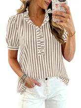 Frill striped puff blouse featuring vertical beige and white stripes with a ruffled collar and short puff sleeves