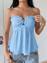 Light blue frill tube top with ruffled edges and a central gold-toned buckle detail for stylish wear