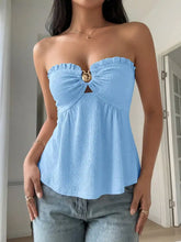 Light blue frill tube top with strapless design and central gold-toned buckle detail for stylish wear