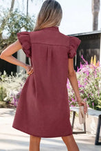 A maroon denim mini dress with frilled short sleeves and a button down collar in denim material