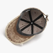 Underside of distressed khaki fringe adjustable cotton baseball cap