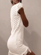 Back view of Fringe Crochet Boat Neck Sweater Dress with white knit fringed shoulders, hem and openwork pattern