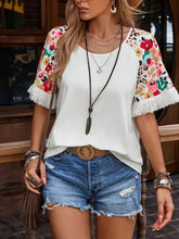 White fringe round neck t-shirt with floral half sleeve and denim shorts