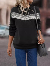 Black crew neck sweatshirt with white geometric pattern and fringe trim machine wash and tumble dry safe