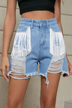 Light blue fringe trim distressed denim shorts with pockets