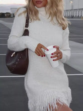 White fuzzy turtleneck sweater dress with fringed hem