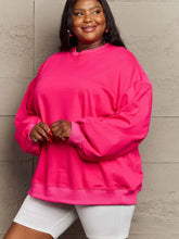 Fuchsia pink oversized dropped shoulder sweatshirt for women, neon pink with ribbed cuffs