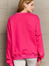 Fuchsia pink oversized dropped shoulder sweatshirt for women with ribbed cuffs