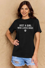 Black short sleeve t-shirt with white text and dog paw graphic