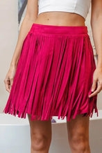 Fuchsia suede skirt with fringe accents and detailing
