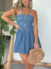 Blue denim halter neck mini dress with front zipper and ruffled hem in full size plus size design