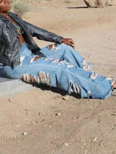 Full size distressed wide-leg jeans plus size in blue denim with frayed ripped details on thighs and knees
