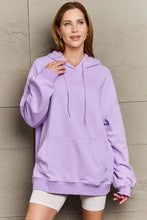 Oversized lavender long sleeve hoodie with drawstring and kangaroo pocket