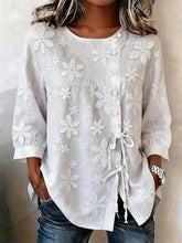Full size white floral embroidered button blouse with button front and side drawstring tie plus size design