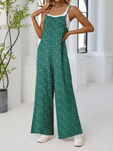 Emerald green plus size floral print wide leg jumpsuit with white trim