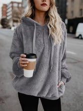 Gray fleece hoodie with half zip front, drawstrings, and full sleeve length in plus size for comfortable wear
