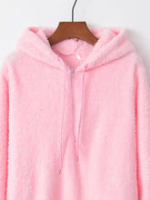Full size half zip drawstring fleece hoodie in soft pink with fluffy material and matching drawstrings featuring long sleeve length