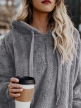 Gray textured fleece hoodie with matching drawstrings featuring a half zip and long sleeve length in plus size