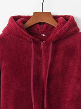 Full size plus size deep red fleece hoodie with half zip, hood, matching drawstrings, and sleeveless design