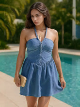Blue denim dress with halter neck, front zipper, and gathered skirt in plus size lace up halter neck denim design