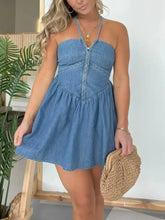 Full size lace up halter neck denim dress featuring a blue fitted bodice and flared skirt in halter neck denim style