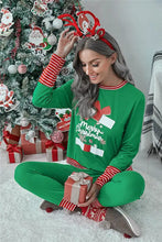 Full size merry christmas lounge set with green fabric, festive graphic, red and white striped sleeve length cuffs, and matching pants