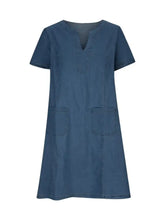 Women’s medium blue wash denim dress with notched short sleeves v-neckline and two front patch pockets